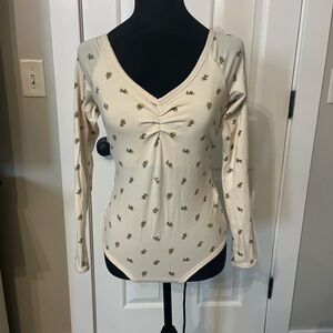 ARQ calico long sleeve body suit